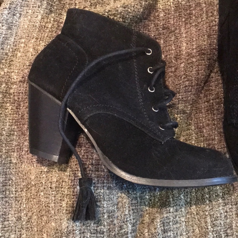 Black faux suede tasseled booties.